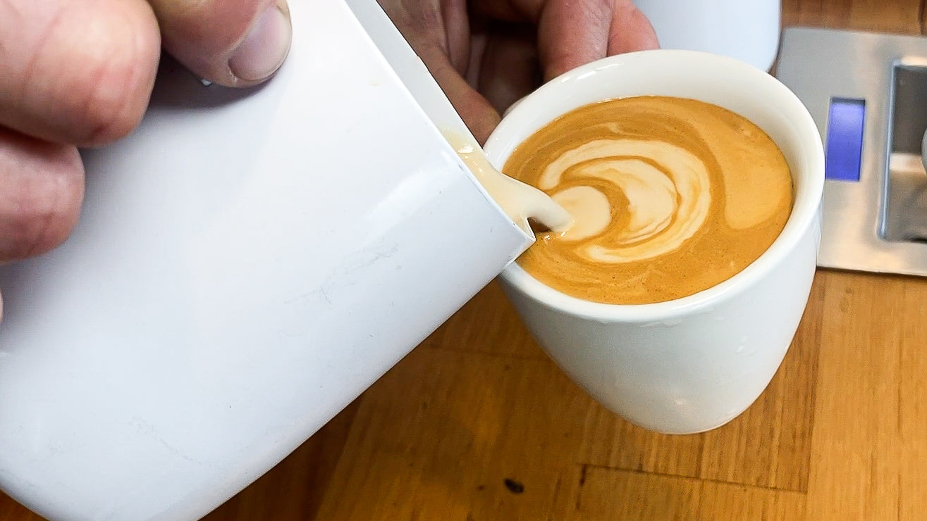 How To Create A Latte Art Pattern On A Long Black – Artisti Coffee Roasters